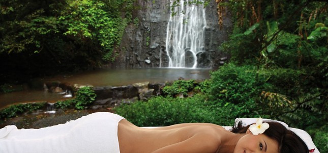 woman during outdoor spa, massage in exotic natural surrounding